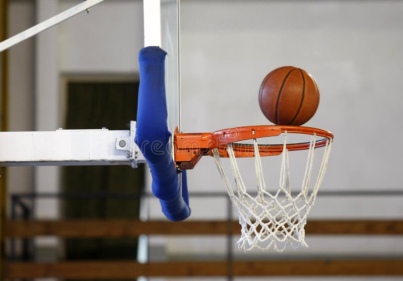 Winning shot at basketball game - ball enters the hoop. Winning shot at basketball game - ball enters the hoop