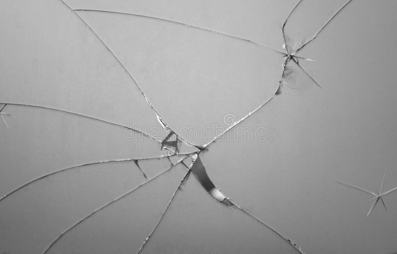 Espelho quebrado quebrado em muitas partes Vidro rachado, o fundo da textura da quebra do espelho