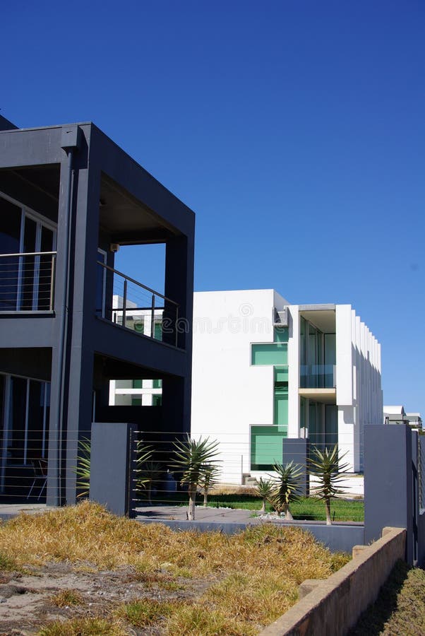 Esplanade Beach Houses. Photograph taken of two modern beach houses on the Esplanade at Henley Beach (Adelaide, Australia stock photo Esplanade Beach Houses. Photograph taken of two modern beach houses on the Esplanade at Henley Beach (Adelaide, Australia stock photo