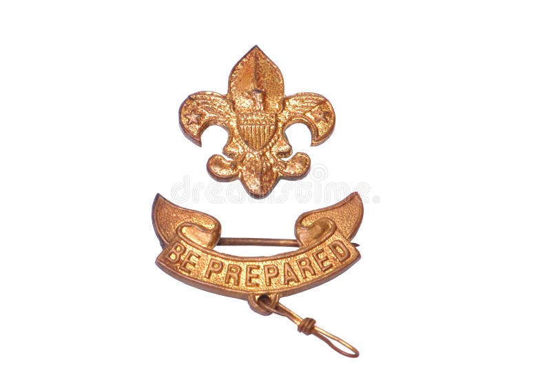 A vintage boy scouts of america pin over white. A vintage boy scouts of america pin over white