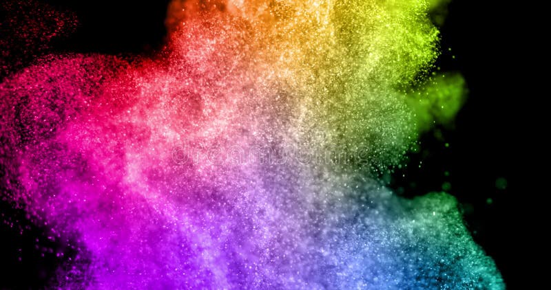 Esplosione multicolore reale della polvere dell'estratto su fondo nero, lento