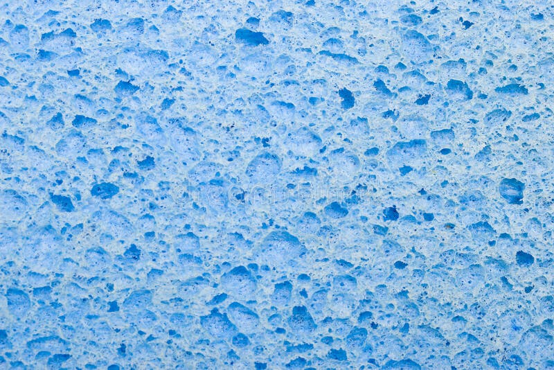 Closeup of bright blue sponge texture. Closeup of bright blue sponge texture