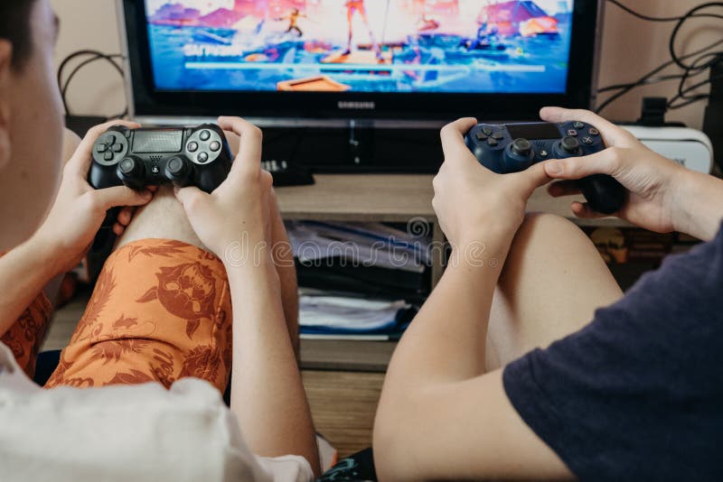 Esports, Competition, Gaming, Multiplayer, Live Streaming. Two Boys Playing  Online Video Game on Playstation. Two Editorial Photography - Image of  monitor, battle: 202411757