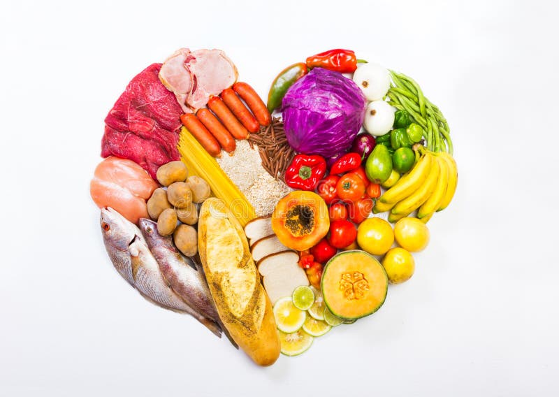 Esposizione a forma di cuore degli alimenti fotografia stock Esposizione a forma di cuore degli alimenti fotografia stock