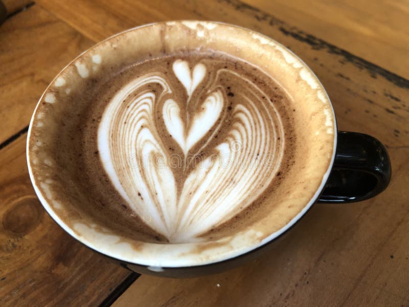 Espresso coffee. cappuccino art. Heart