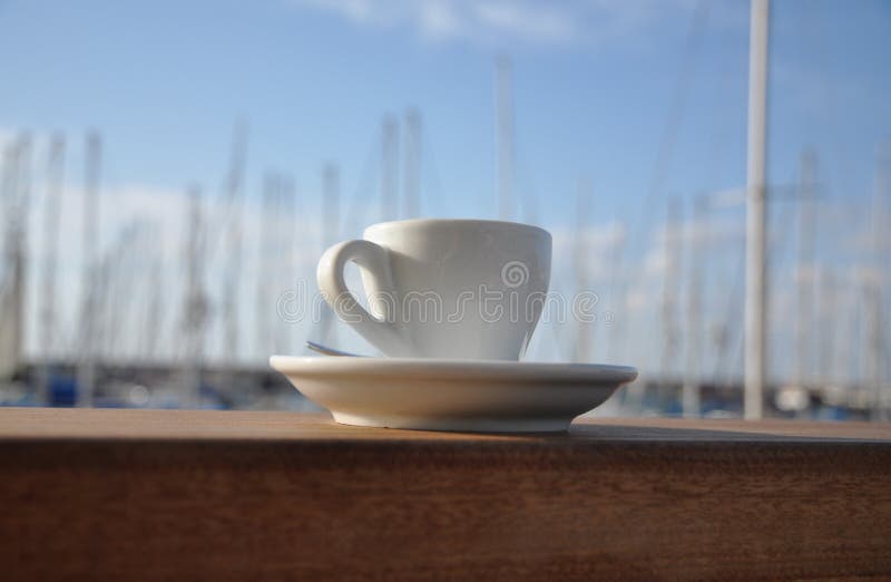 Espresso cup on bar by the port royalty free stock photography Espresso cup on bar by the port royalty free stock photography