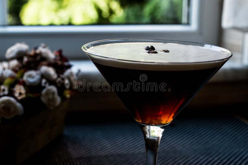Glass Of Espresso Martini With Coffee Beans On White Background Stock