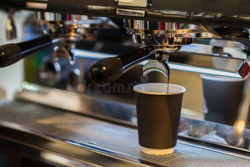 https://thumbs.dreamstime.com/b/espresso-pouring-coffee-machine-disposable-paper-cup-coffee-takeaway-coffee-concept-espresso-pouring-coffee-217288269.jpg