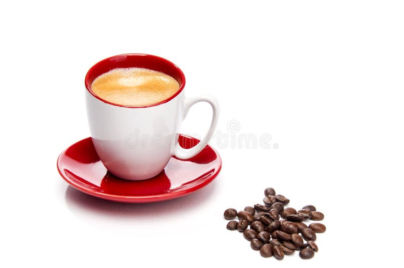 Espresso in red and white cup with coffee beans
