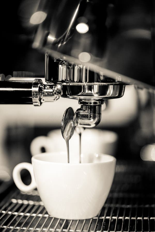Espresso Shot from Coffee Machine in Coffee Shop,Coffee Maker in Stock