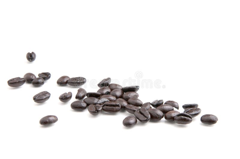 Fresh roasted diagonal row of espresso beans on white background. Fresh roasted diagonal row of espresso beans on white background