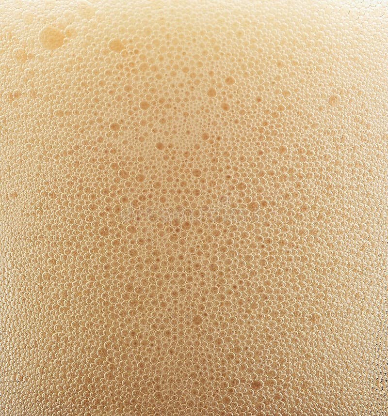 Primer plano de espuma de cerveza foto de archivo libre de regalías