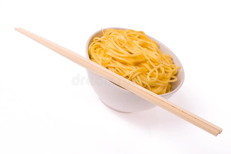 Ess-Stäbchen, Schüssel und Nudeln lizenzfreies stockbild Ess-Stäbchen, Schüssel und Nudeln lizenzfreies stockbild
