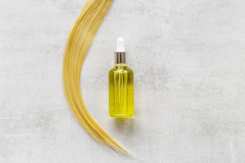 Essential Oil for Hair Care with Blond Hair Curl Stock Image Image of