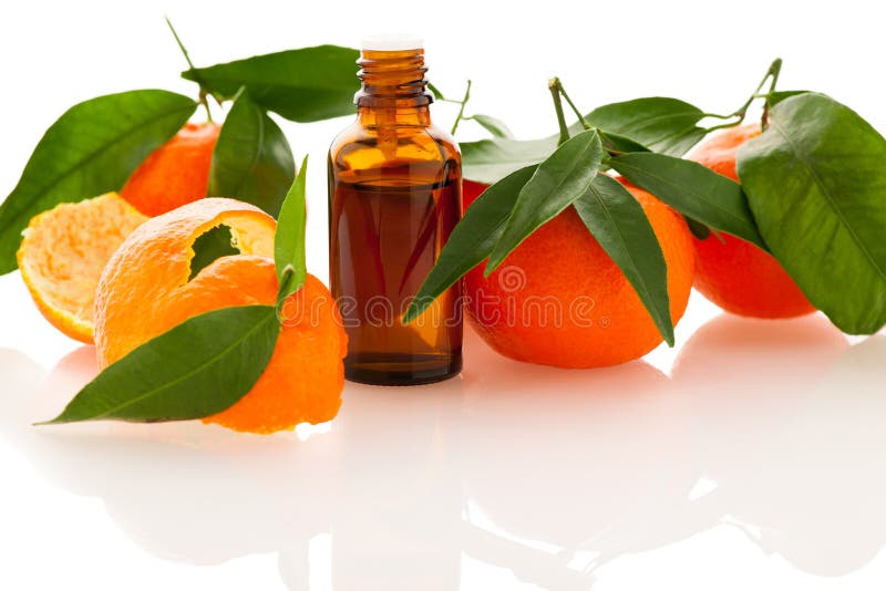 Essential oil of orange mandarin citrus fruit in little bottle d
