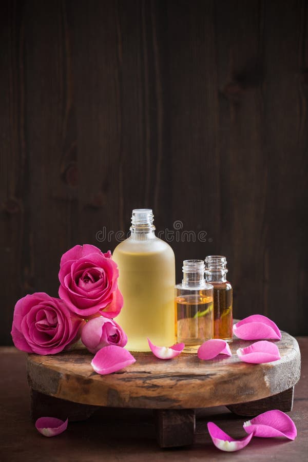 Essential Oil and Rose Flowers Aromatherapy Spa Perfumery Stock Photo