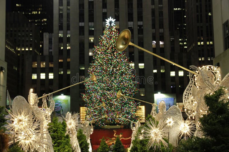 This was shot in New York City on Dec. 12, 2009. Rockefeller Center lighted angels and the Christmas tree are attracting thousands of people every day and night. This was shot in New York City on Dec. 12, 2009. Rockefeller Center lighted angels and the Christmas tree are attracting thousands of people every day and night.