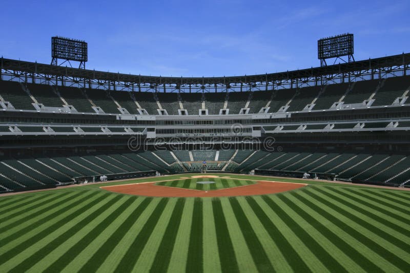 Baseball stadium showing field, bases and empty seats. Baseball stadium showing field, bases and empty seats