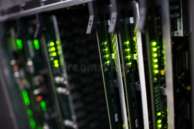 Communication racks in a datacenter filled with switches and routers that keep all the servers connected. Communication racks in a datacenter filled with switches and routers that keep all the servers connected.