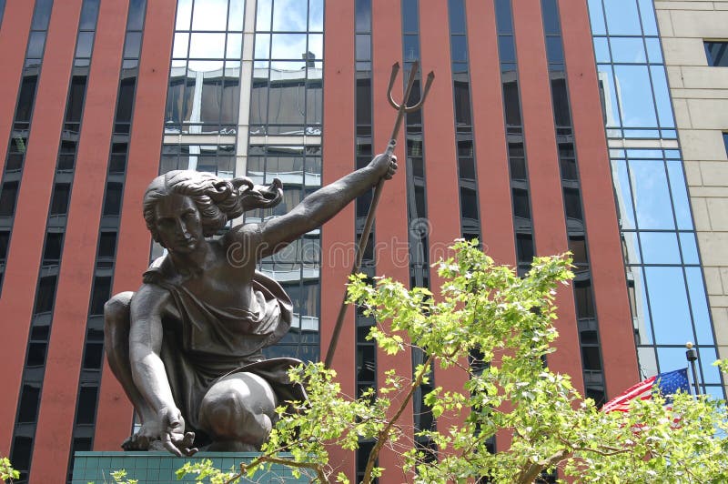 This is the `Portlandia` statue on a spring day in Portland, Oregon. This is the `Portlandia` statue on a spring day in Portland, Oregon.