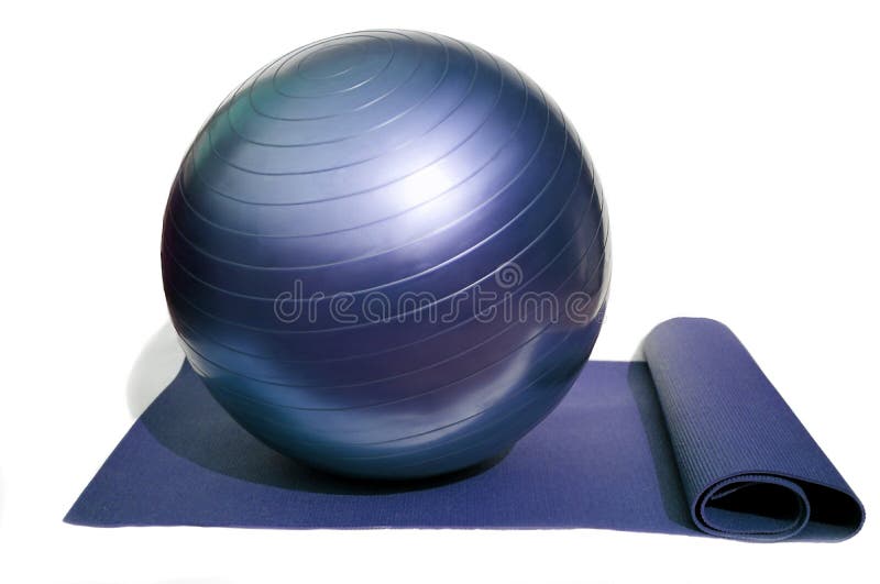 Yoga mat and pilates ball isolated on white background. Yoga mat and pilates ball isolated on white background