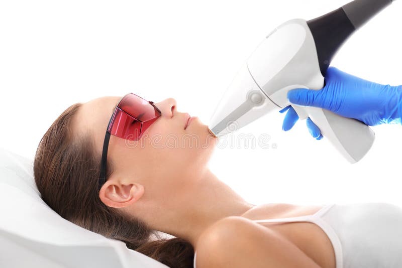 Estetista, depilazione del laser immagine stock Estetista, depilazione del laser immagine stock