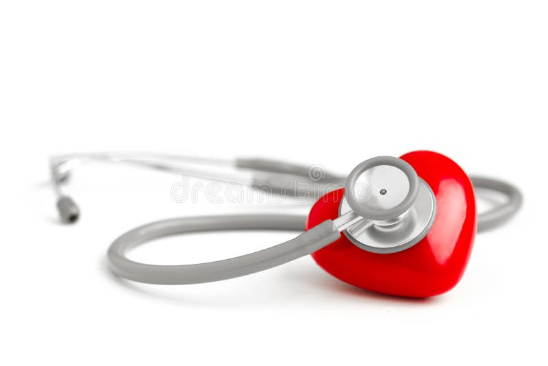 Estetoscopio y corazón rojo aislados en el fondo blanco imagenes de archivo Estetoscopio y corazón rojo aislados en el fondo blanco imagenes de archivo