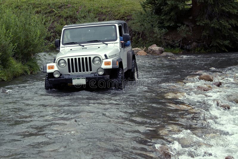 Jeep 4-wheeling above Lead King Basin. Jeep 4-wheeling above Lead King Basin