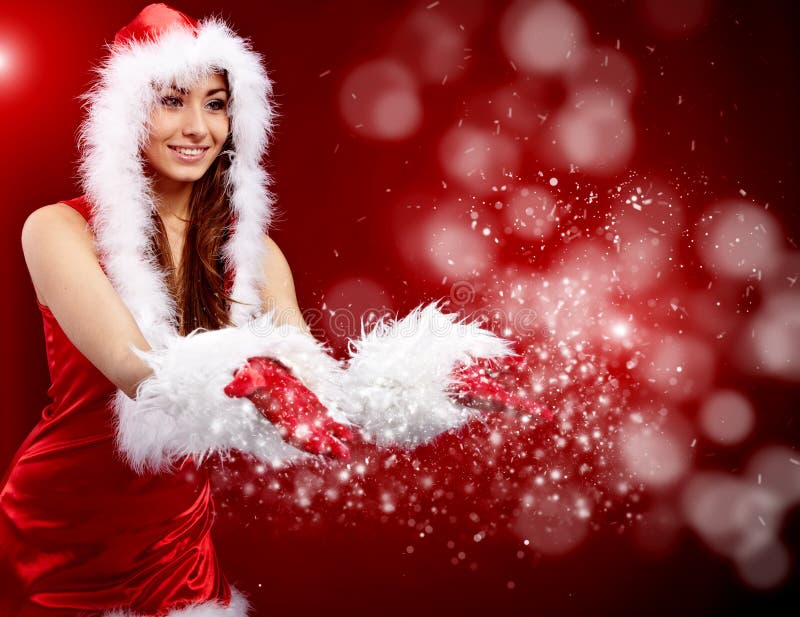 Mulher de Natal segurando uma estrela fotografia de stock