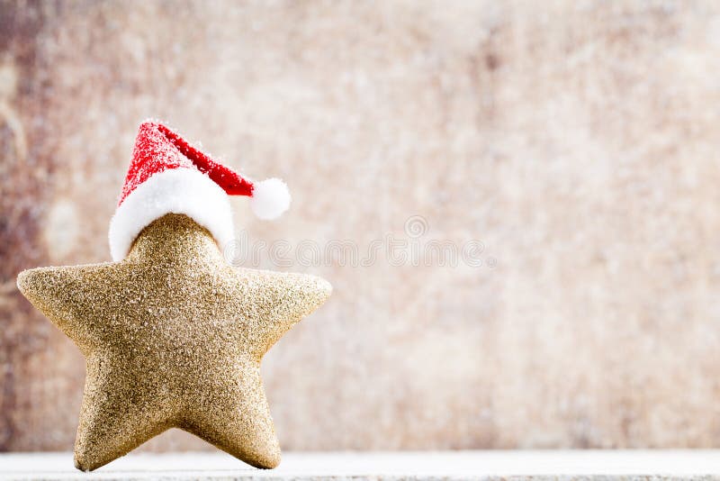 Estrela do Natal com chapéu de Santa Fundo dos vintages