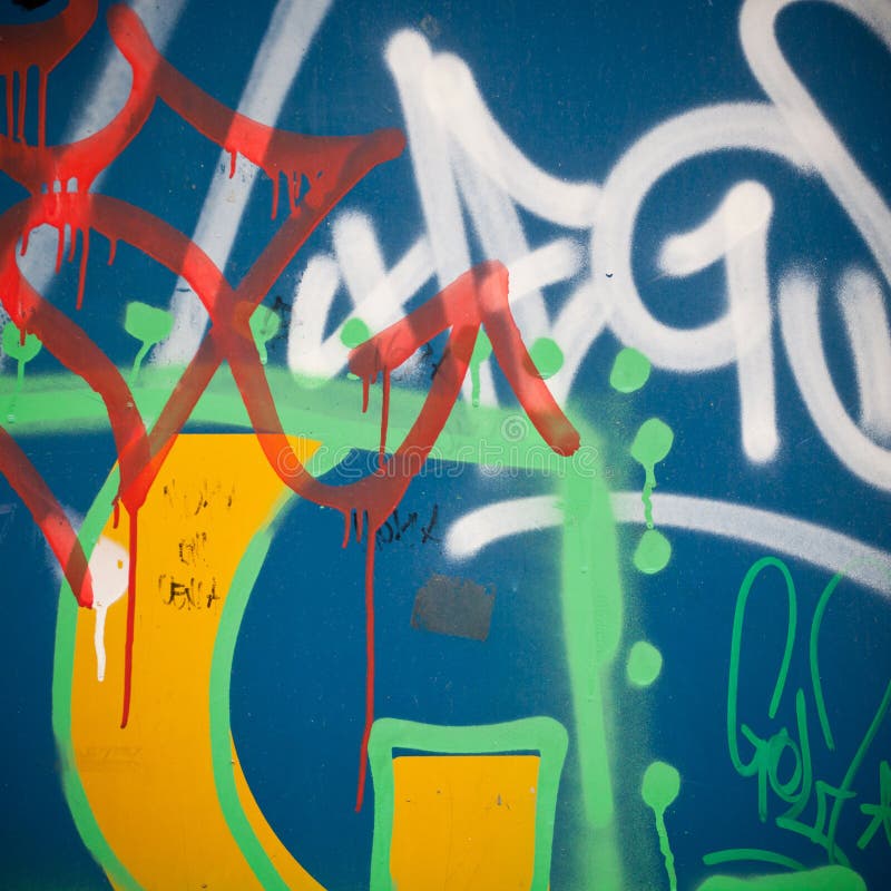 Estremo vicino su dei graffiti sul muro di cemento immagini stock Estremo vicino su dei graffiti sul muro di cemento immagini stock