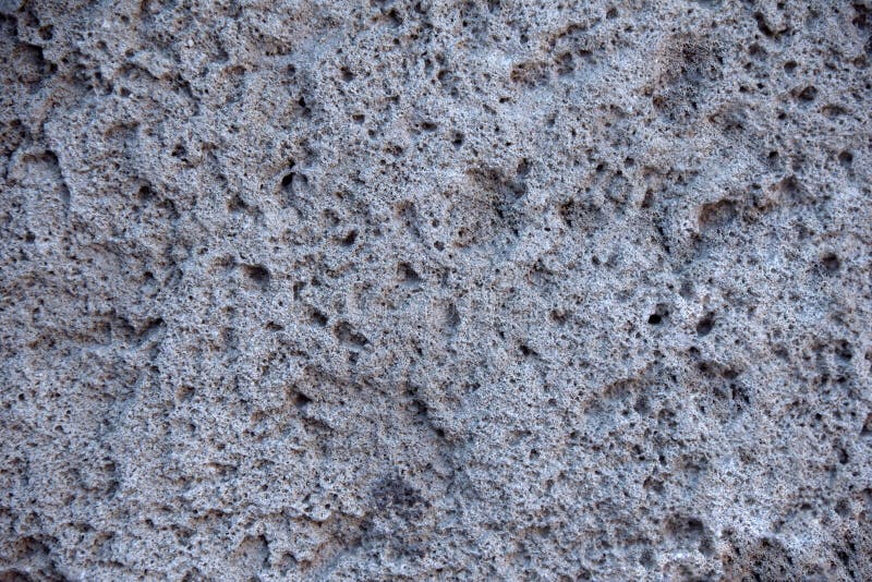 Estructura de piedra porosa del fondo del origen volcánico del cráter de un volcán extinto, imagen de archivo Estructura de piedra porosa del fondo del origen volcánico del cráter de un volcán extinto, imagen de archivo