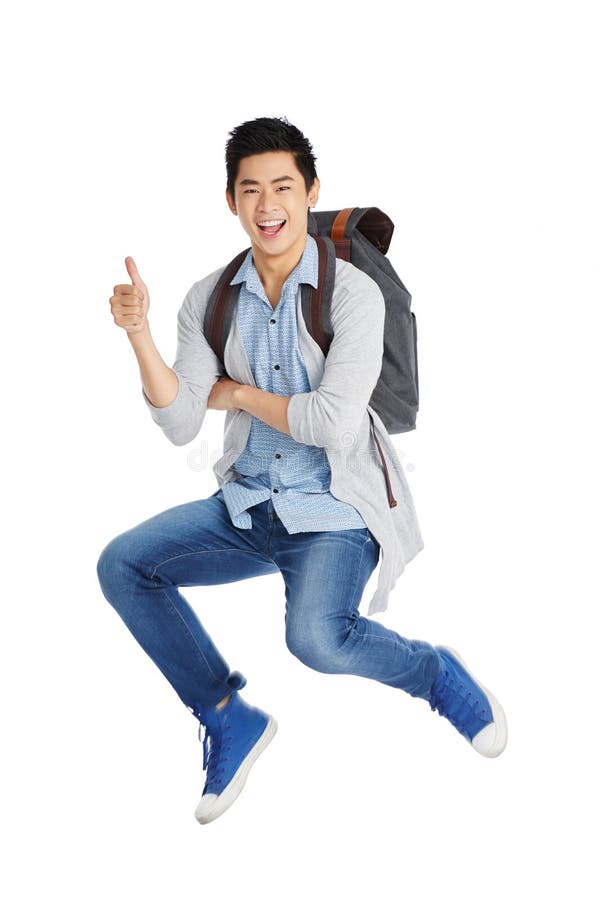 Estudante alegre Showing Thumb Up imagem de stock royalty free Estudante alegre Showing Thumb Up imagem de stock royalty free