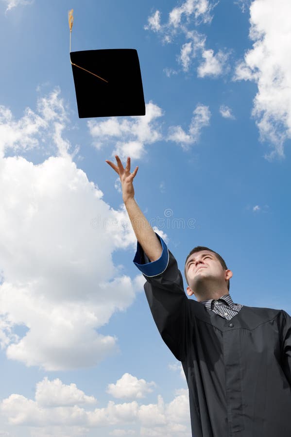 One graduate student tossing up hat over blue sky. One graduate student tossing up hat over blue sky