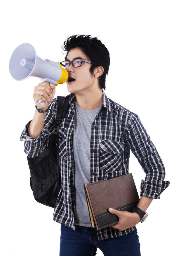 College student shouting through megaphone isolated on white background. College student shouting through megaphone isolated on white background