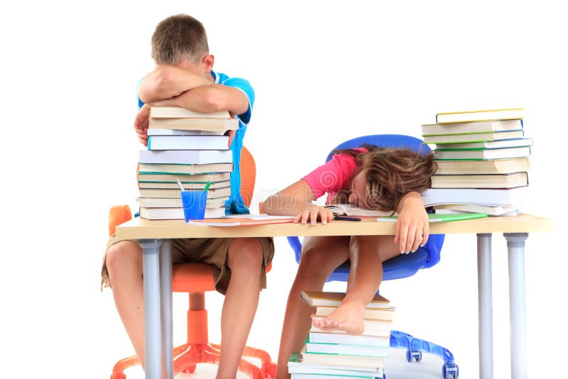 Estudiantes dormidos después de estudiar fotografía de archivo libre de regalías Estudiantes dormidos después de estudiar fotografía de archivo libre de regalías
