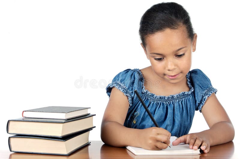 Menina adorável a estudar foto de stock