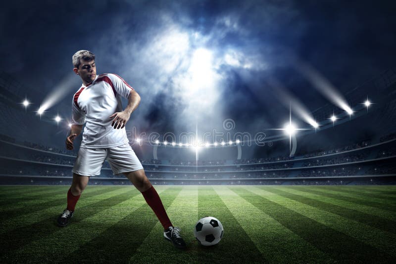 Estádio de futebol e jogador foto de stock royalty free Estádio de futebol e jogador foto de stock royalty free