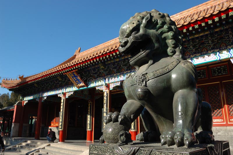 A statue of copper lion at the gate of Summer Palace in Beijing, China. A statue of copper lion at the gate of Summer Palace in Beijing, China