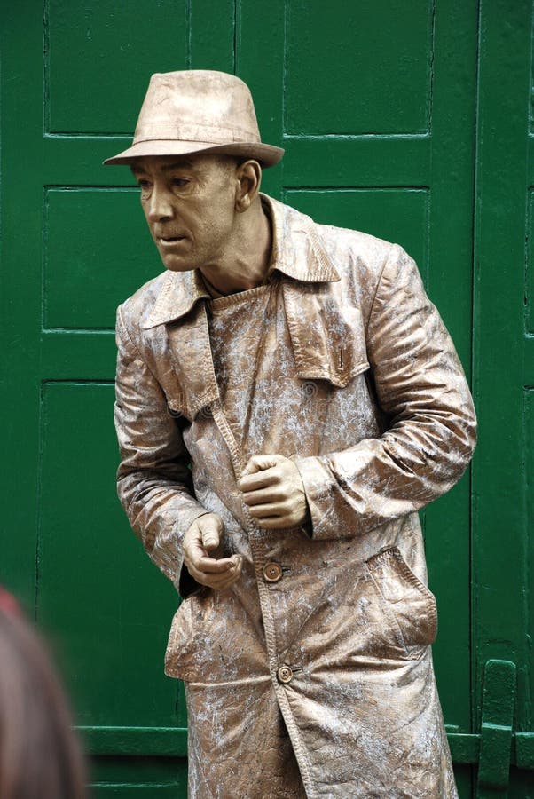 A street artist performs as a human statue at the Jack In The Green festival on May 5, 2009 at Hastings in East Sussex, England. A street artist performs as a human statue at the Jack In The Green festival on May 5, 2009 at Hastings in East Sussex, England.