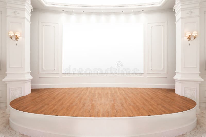 Etapa del auditorio con el piso de madera y el tablero blanco