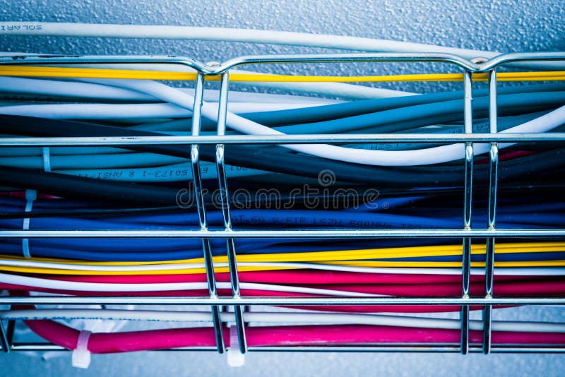 Ethernet cables in a cable guard leading along the ceiling insid royalty free stock photos