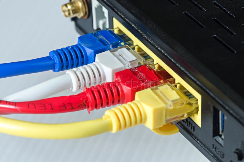 Ethernet cables connect to router or switch royalty free stock photos