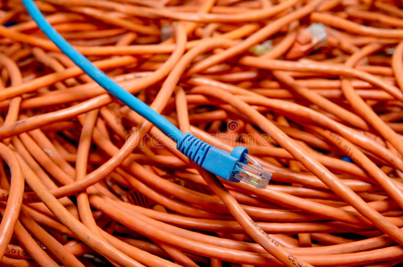 Ethernet cables tangled blue and orange. See my other works in portfolio.