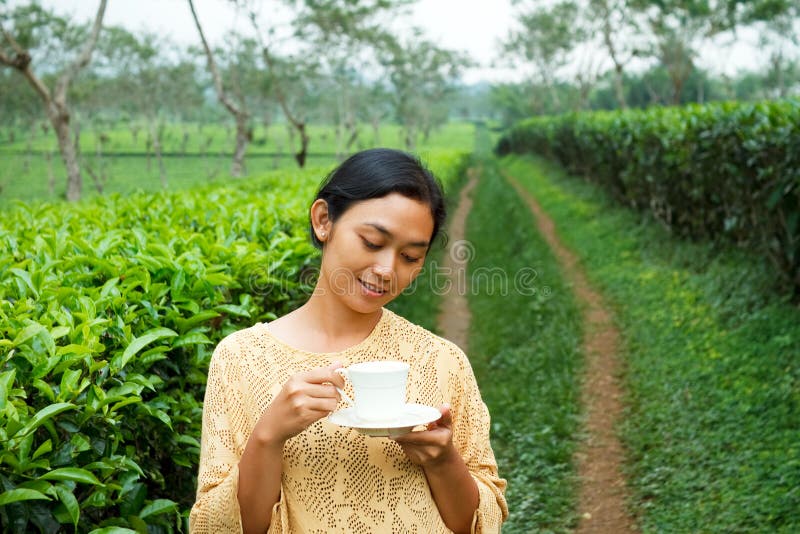 Ethic young woman relaxing at tea plantation