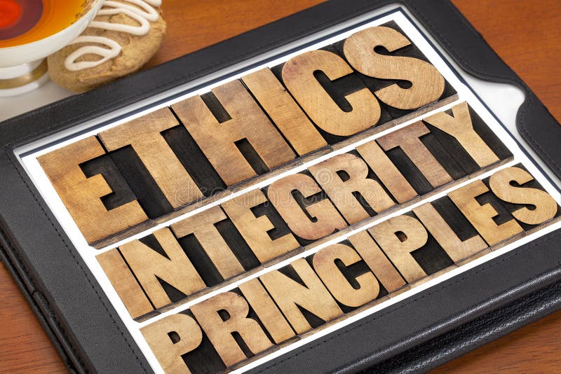 Ethics, integrity and principles word abstract - ethical concept on a digital tablet with a cup of tea