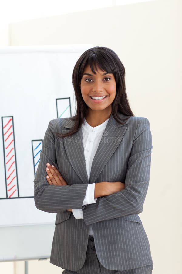 Download Ethnic Businesswoman With Folded Arms Stock Image - Image of businesspeople, presentation: 12257013