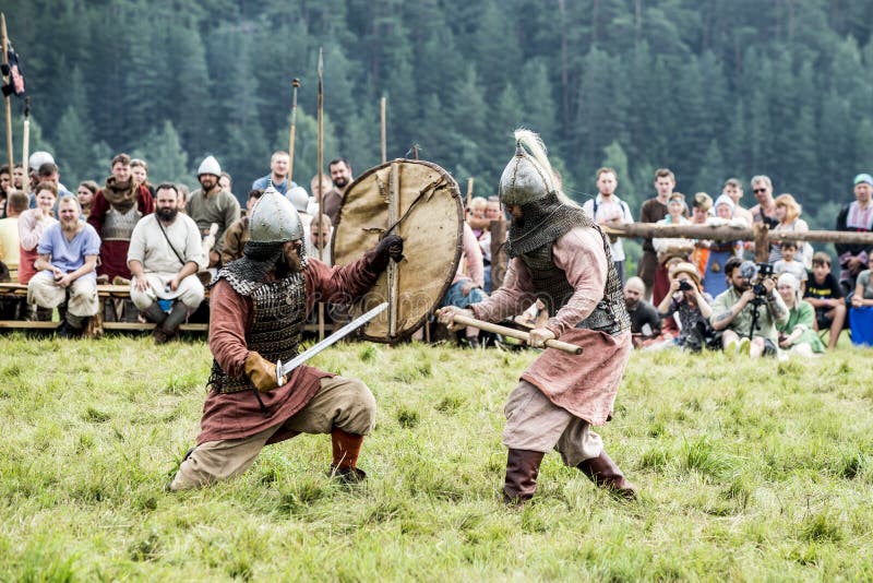 Ethnic Festival of Ancient Culture. Reconstruction of medieval warriors of knights in battle