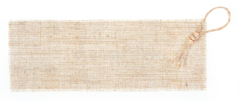 Etiqueta de la harpillera con la decoración sobre blanco imagen de archivo libre de regalías Etiqueta de la harpillera con la decoración sobre blanco imagen de archivo libre de regalías