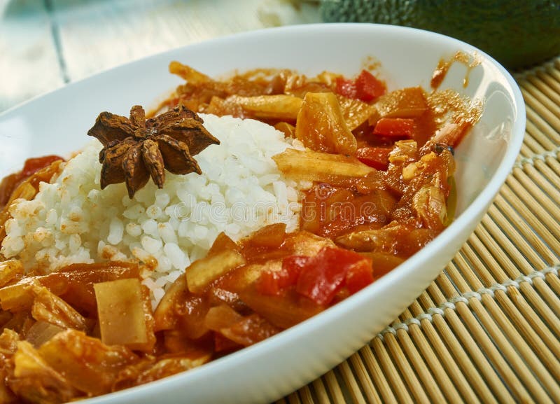 Etouffee  dish found in both Cajun and Creole cuisine typically served with shellfish over rice